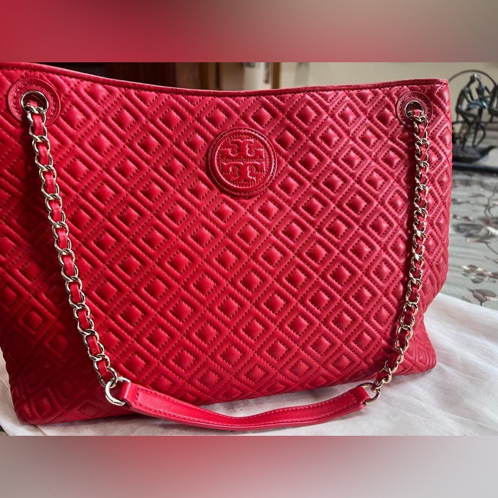 Tory Burch precise quilting hi lighted by diamond chain and leather strap tote